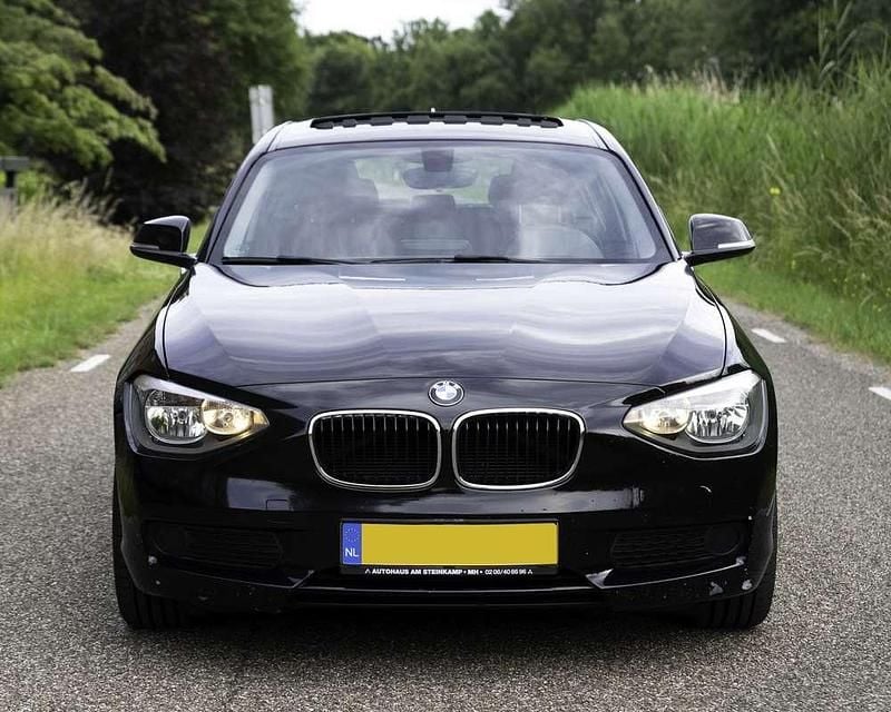 Zwart Gebruikt 2012 BMW 116 Hatchback | € 6.500 (Super prijs) - Afbeelding 1/4