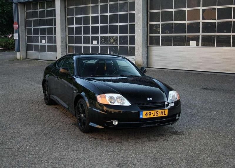 Zwart Gebruikt 2002 Hyundai Coupé Style Coupé | € 5.000 - Afbeelding 1/4