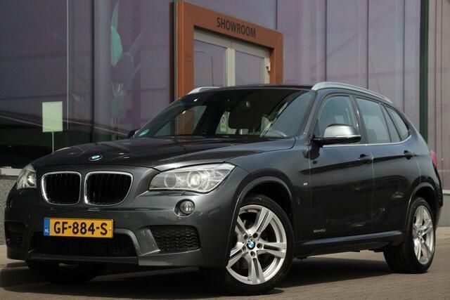 Grijs, metallic lak Gebruikt 2015 BMW X1 Executive SUV | € 17.945 (Goede deal) - Afbeelding 1/4