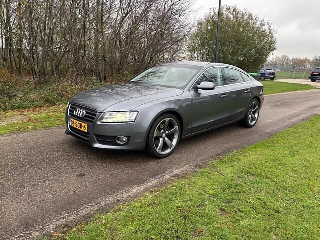 Grijs Gebruikt 2011 Audi A5 Sportback Proline Hatchback | € 11.450 (Eerlijke prijs) - Afbeelding 1/4