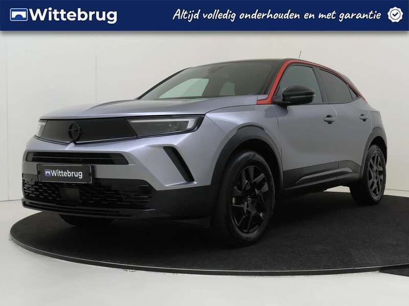 Grijs Gebruikt 2023 Opel Mokka GS Line SUV | € 22.625 (Eerlijke prijs) - Afbeelding 1/3