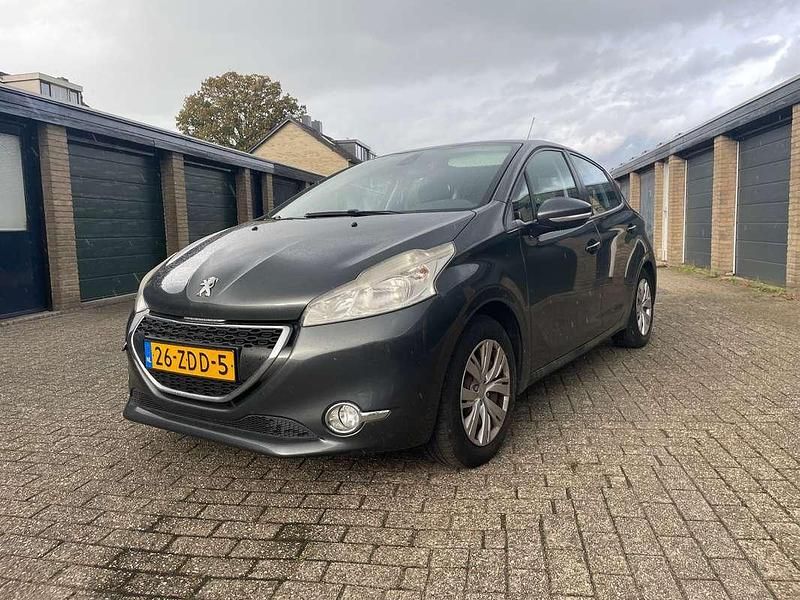 Grijs Gebruikt 2012 Peugeot 208 Envy Hatchback | € 1.650 (Super prijs) - Afbeelding 1/4