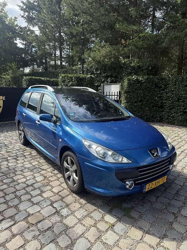 Blauw Gebruikt 2007 Peugeot 307 Premium Stationwagen | € 850 (Eerlijke prijs) - Afbeelding 1/4