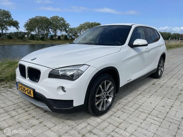 Wit Gebruikt 2013 BMW X1 Comfort Edition SUV | € 10.250 (Eerlijke prijs) - Afbeelding 1/4