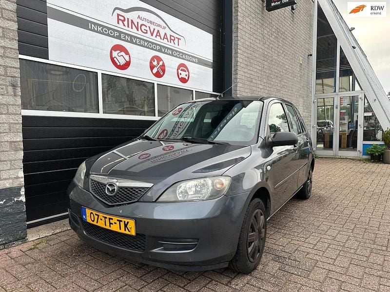 Grijs Occasion 2006 Mazda 2 Exclusive MPV | € 1.499 (Eerlijke prijs) - Afbeelding 1/4