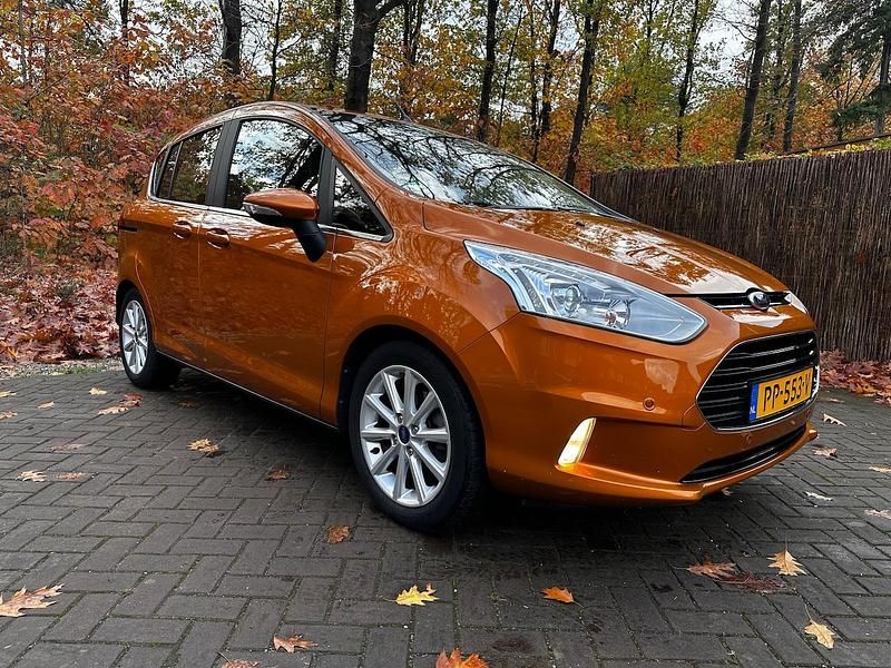 Oranje (metallic) Occasion 2017 Ford B-MAX Titanium MPV | € 6.750 (Eerlijke prijs) - Afbeelding 1/4