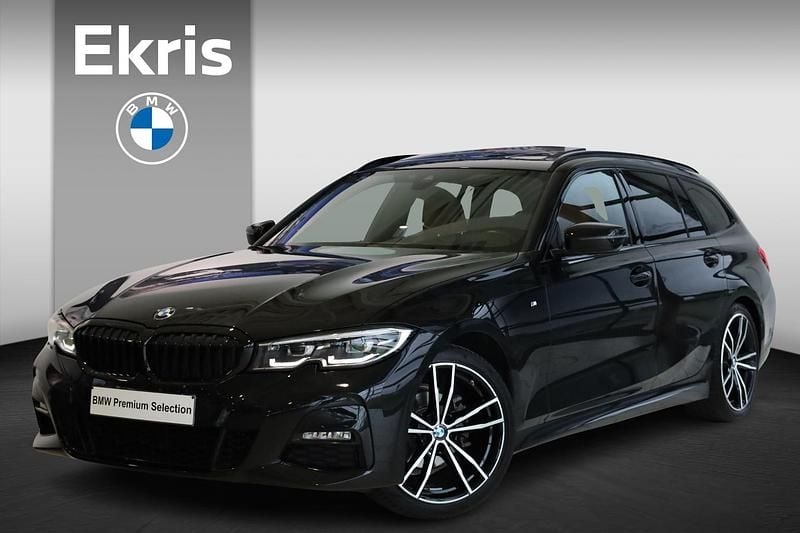 Zwart (metallic) Gebruikt 2021 BMW 318 Executive Stationwagen | € 33.900 (Duur) - Afbeelding 1/4