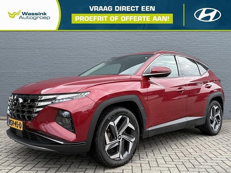 Rood metallic Gebruikt 2023 Hyundai Tucson Comfort SUV | € 34.695 (Eerlijke prijs) - Afbeelding 1/4