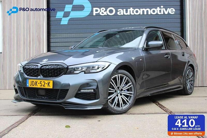 Grijs Gebruikt 2021 BMW 330e M Sport Stationwagen | € 30.995 (Goede deal) - Afbeelding 1/4