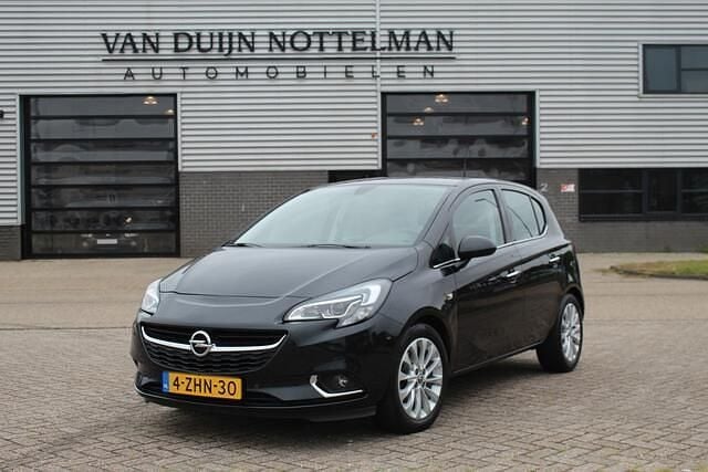 Zwart Gebruikt 2015 Opel Corsa Cosmo Hatchback | € 9.450 (Iets duurder) - Afbeelding 1/4