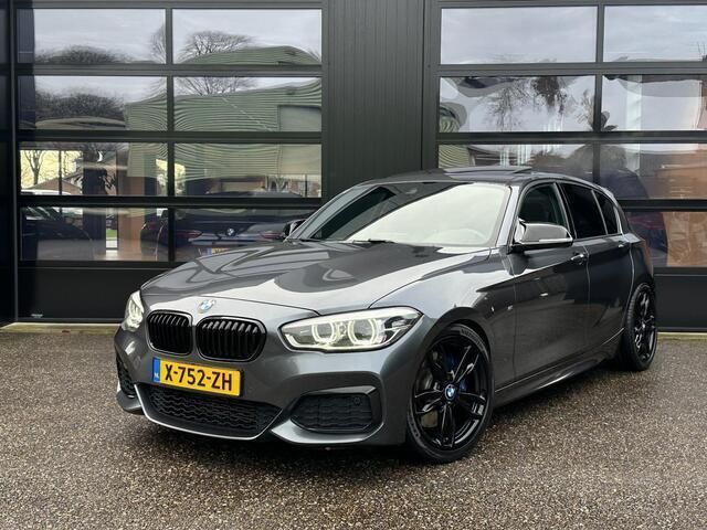 Grijs Gebruikt 2015 BMW M135 Comfort Edition Hatchback | € 22.999 (Eerlijke prijs) - Afbeelding 1/4
