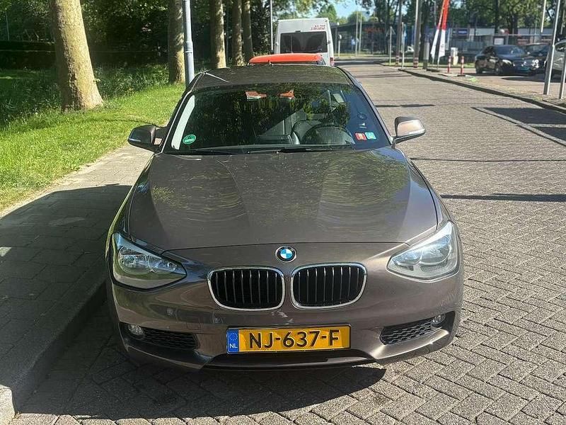 Bruin Gebruikt 2012 BMW 118 Coupé Coupé | € 7.100 - Afbeelding 1/4