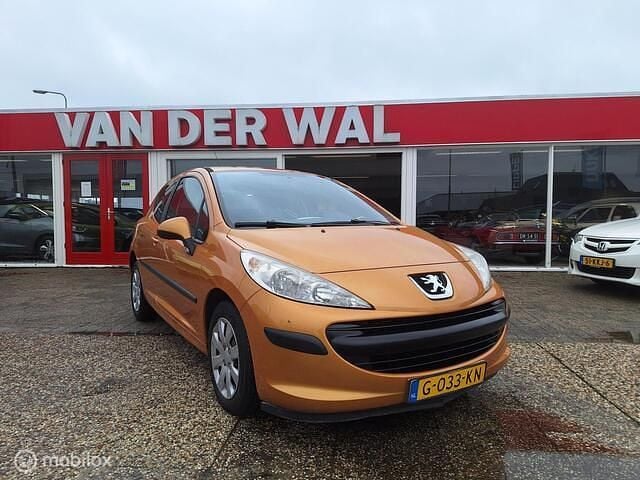 Oranje Gebruikt 2006 Peugeot 207 Hatchback | € 1.775 (Eerlijke prijs) - Afbeelding 1/4