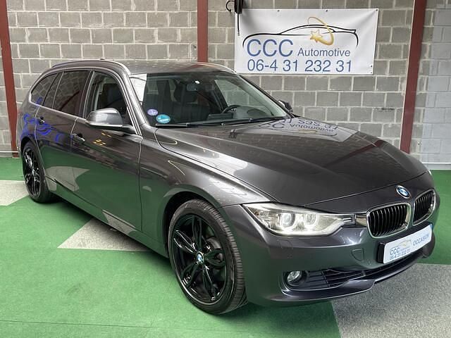 Grijs Gebruikt 2014 BMW 328 Executive Stationwagen | € 14.950 (Goede deal) - Afbeelding 1/4