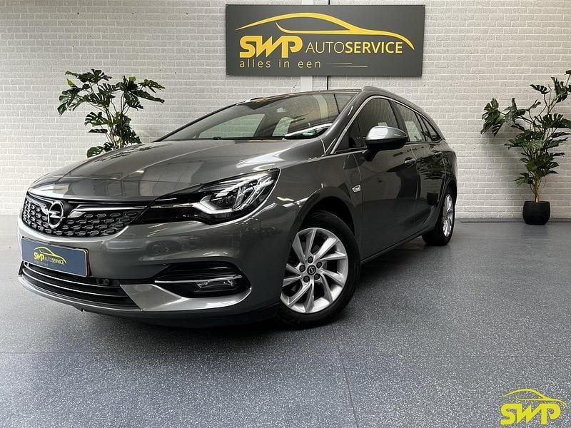 Grijs Gebruikt 2020 Opel Astra Ultimate Stationwagen | € 11.950 (Eerlijke prijs) - Afbeelding 1/4