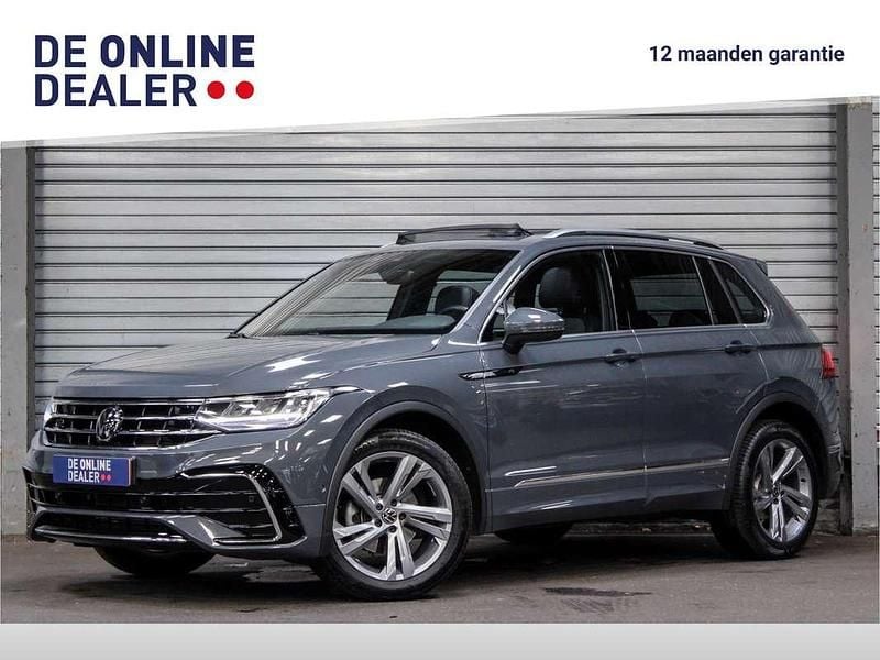 Grijs Gebruikt 2023 VW Tiguan R-line SUV | € 42.850 (Eerlijke prijs) - Afbeelding 1/4