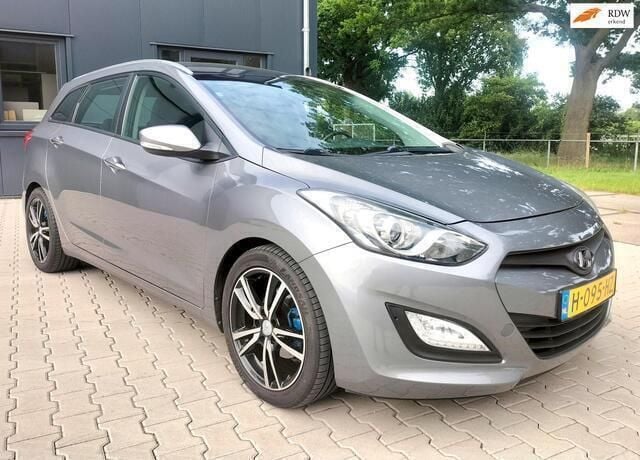 Grijs Gebruikt 2013 Hyundai i30 Edition Stationwagen | € 8.995 (Eerlijke prijs) - Afbeelding 1/4
