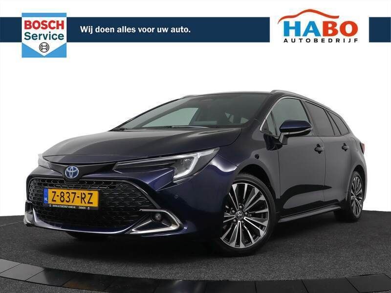 Blauw, metallic lak Gebruikt 2024 Toyota Corolla Stationwagen | € 29.450 (Eerlijke prijs) - Afbeelding 1/4