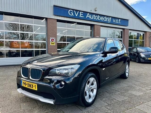 Zwart Gebruikt 2012 BMW X1 SUV | € 10.850 (Super prijs) - Afbeelding 1/4