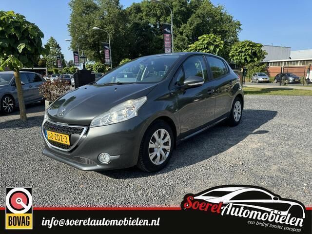 Grijs Gebruikt 2012 Peugeot 208 Envy Hatchback | € 5.500 (Eerlijke prijs) - Afbeelding 1/4