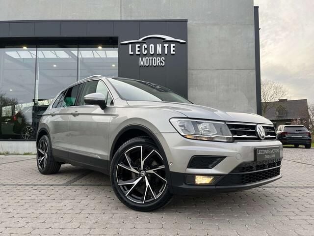 Grijs Gebruikt 2019 VW Tiguan SUV | € 22.990 (Goede deal) - Afbeelding 1/4