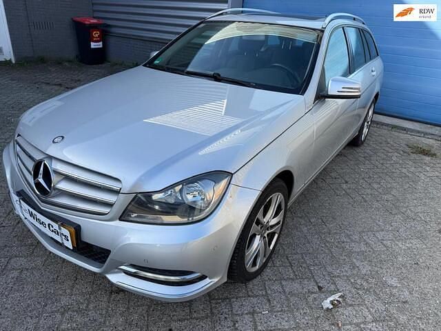 Grijs Gebruikt 2012 Mercedes C180 Avantgarde Stationwagen | € 10.950 (Eerlijke prijs) - Afbeelding 1/4