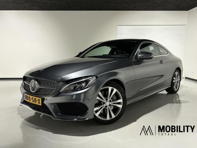 Grijs Gebruikt 2016 Mercedes C250 Prestige Coupé | € 26.950 (Eerlijke prijs) - Afbeelding 1/4