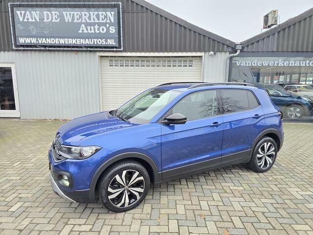 Blauw, metallic lak Gebruikt 2021 VW T-Cross Business SUV | € 21.950 (Eerlijke prijs) - Afbeelding 1/4