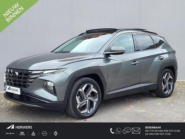 Amazon gray metallic (a5g) Gebruikt 2022 Hyundai Tucson Premium SUV | € 31.385 (Eerlijke prijs) - Afbeelding 1/4