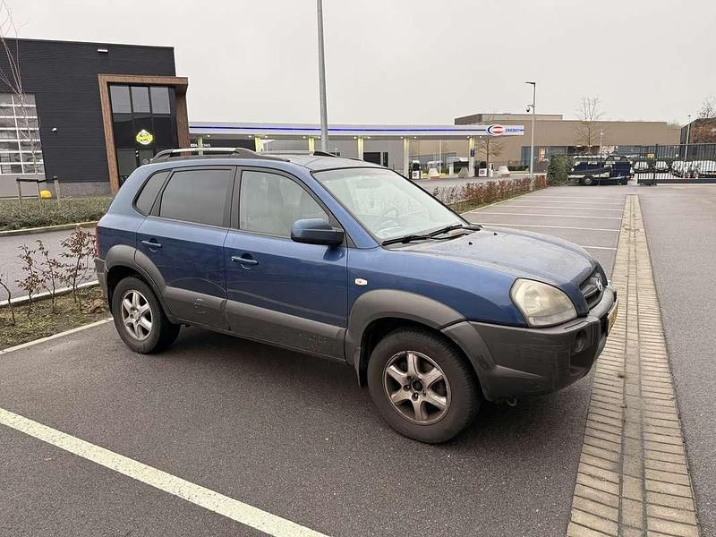 Blauw Gebruikt 2005 Hyundai Tucson Dynamiq SUV | € 999 (Super prijs) - Afbeelding 1/4