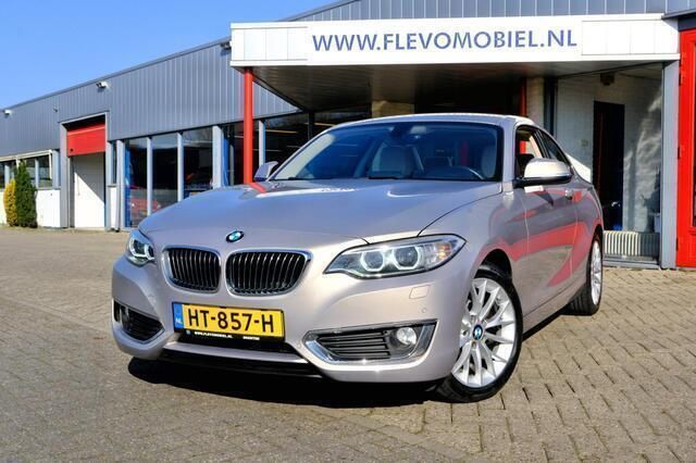 Grijs, metallic lak Gebruikt 2016 BMW 218 Executive Coupé | € 16.750 (Super prijs) - Afbeelding 1/4