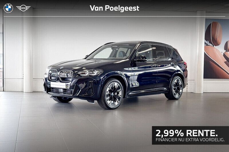 Carbonschwarz metallic (zwart metallic) Gebruikt 2024 BMW iX3 Executive SUV | € 58.900 (Eerlijke prijs) - Afbeelding 1/4