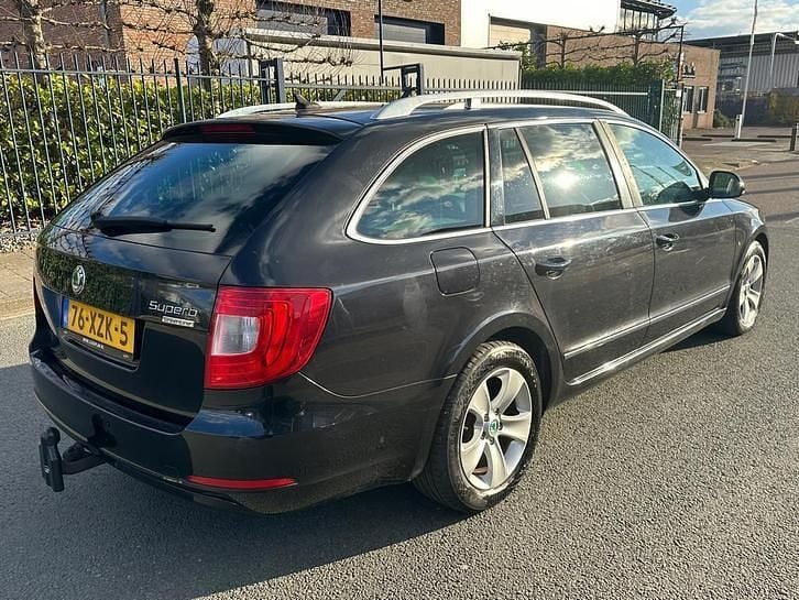 Occasion Skoda Superb Business Line 105 PK (77 kW) 2012 Zwart Stationwagen