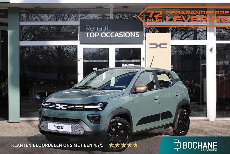 Groen Nieuw 2025 Dacia Spring Extreme Hatchback | € 21.899 - Afbeelding 1/4