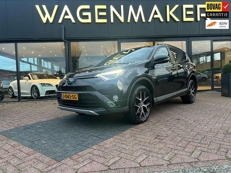 Zwart (metallic) Gebruikt 2016 Toyota RAV4 Hybrid Style SUV | € 18.950 (Eerlijke prijs) - Afbeelding 1/4