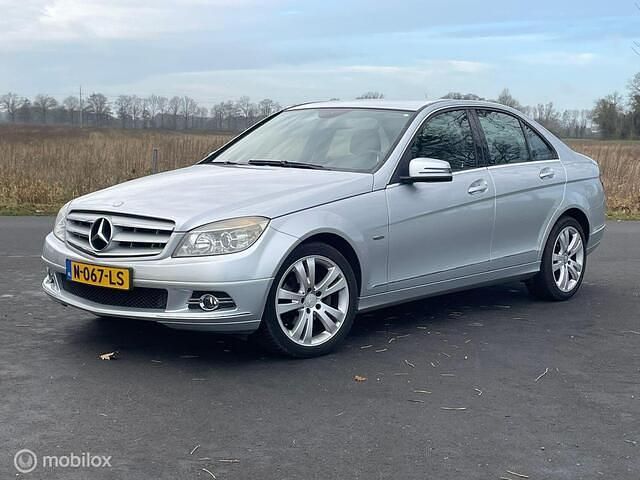 Grijs Occasion 2009 Mercedes C180 Sedan | € 5.750 (Goede deal) - Afbeelding 1/4