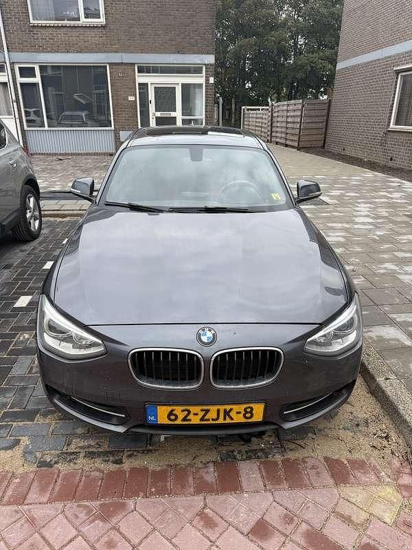 Grijs Gebruikt 2012 BMW 114 Sport Line Hatchback | € 4.000 (Super prijs) - Afbeelding 1/4