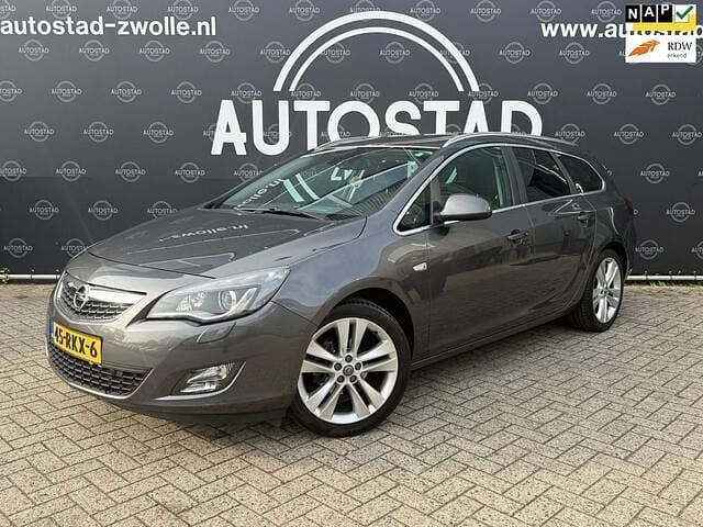 Grijs Gebruikt 2011 Opel Astra Sport Stationwagen | € 4.795 (Goede deal) - Afbeelding 1/4