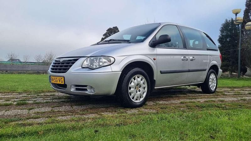 Zilver Gebruikt 2006 Chrysler Voyager MPV | € 2.500 (Eerlijke prijs) - Afbeelding 1/4