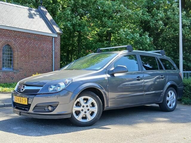 Grijs Gebruikt 2009 Opel Astra Stationwagen | € 1.699 (Eerlijke prijs) - Afbeelding 1/4