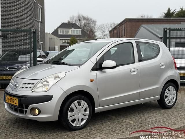 Grijs Occasion 2009 Nissan Pixo Acenta Hatchback | € 3.999 (Eerlijke prijs) - Afbeelding 1/4