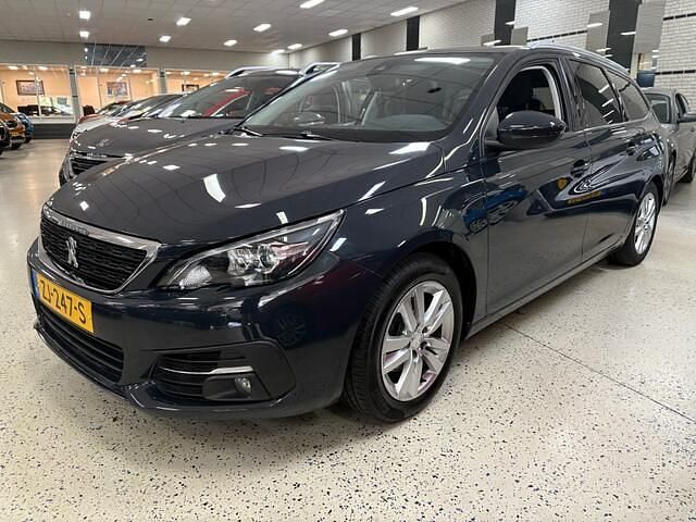 Grijs Gebruikt 2019 Peugeot 308 SW Stationwagen | € 8.250 (Goede deal) - Afbeelding 1/4