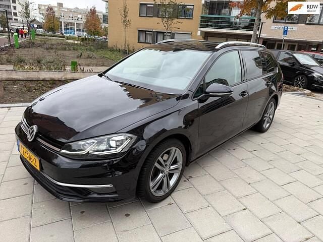 Zwart Gebruikt 2017 VW Golf VII Comfortline Stationwagen | € 9.499 (Eerlijke prijs) - Afbeelding 1/4
