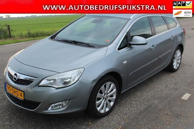 Grijs Gebruikt 2011 Opel Astra Cosmo Stationwagen | € 3.350 (Goede deal) - Afbeelding 1/4