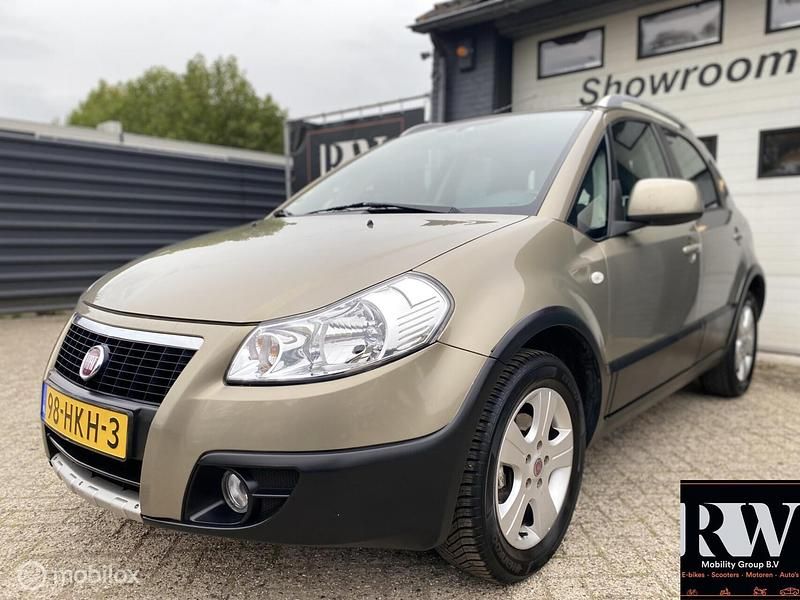 Beige Occasion 2009 Fiat Sedici Emotion SUV | € 4.495 (Eerlijke prijs) - Afbeelding 1/4