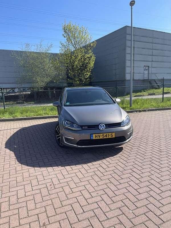 Grijs Gebruikt 2015 VW Golf VII GTE Stationwagen | € 13.500 (Eerlijke prijs) - Afbeelding 1/4
