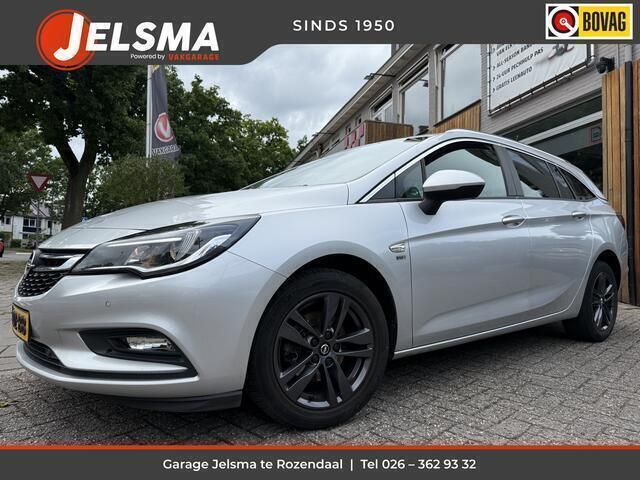 Grijs Gebruikt 2019 Opel Astra Edition+ Stationwagen | € 13.900 (Eerlijke prijs) - Afbeelding 1/4