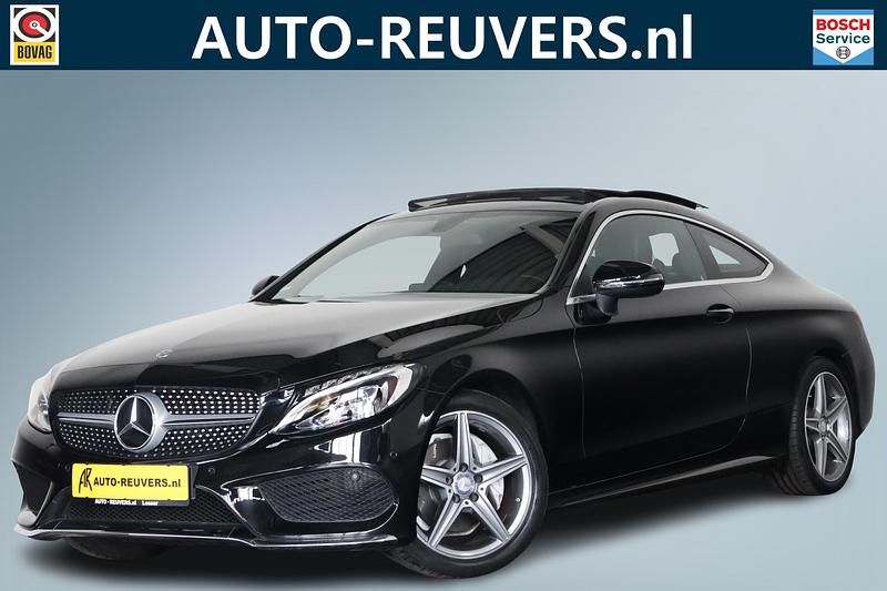 Zwart Gebruikt 2016 Mercedes C180 AMG line Coupé | € 23.900 (Eerlijke prijs) - Afbeelding 1/4
