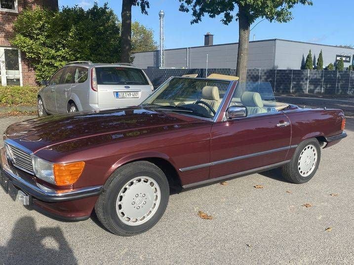 Roodpajettrot Gebruikt 1987 Mercedes 560 Cabriolet | € 47.950 - Afbeelding 1/4