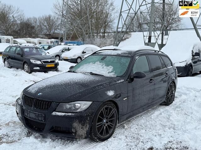 Zwart Occasion 2006 BMW 335 Executive Stationwagen | € 5.950 - Afbeelding 1/4
